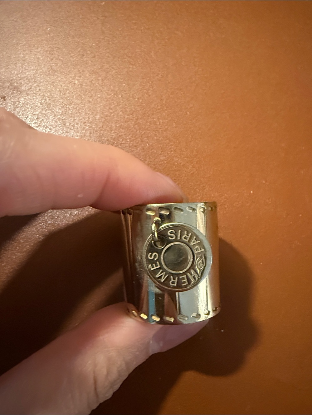 Hermès Gold scarf ring with padlock charm